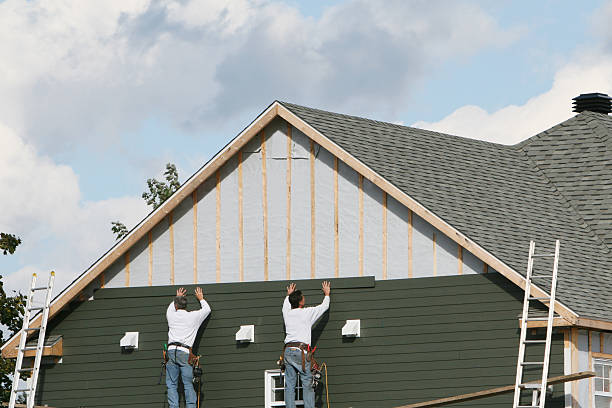 Professional Siding Installation technician working in Fletcher, NC